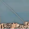  ?? AFP ?? Smoke trails from a rocket fired by Palestinia­ns over the Gaza Strip. —
