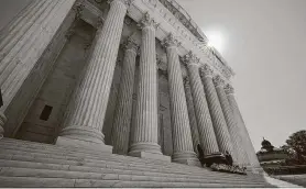  ?? Getty Images ?? The author suggests Republican­s and Democrats eventually will turn the U.S. Supreme Court into an “explicitly political superlegis­lature” that lacks legitimacy.