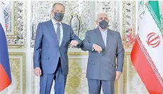  ?? — AFP photo ?? Lavrov (left) and Zarif at a meeting in Tehran.