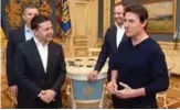  ??  ?? This handout picture taken and released by the Ukrainian Presidenti­al press-service shows President Volodymyr Zelensky, left, talking with US actor and film producer Tom Cruise, right, during their meeting in Kiev. — AFP