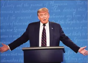  ?? Julio Cortez / Associated Press ?? President Donald Trump gestures while speaking during the presidenti­al debate Tuesday at Case Western University and Cleveland Clinic in Cleveland, Ohio.