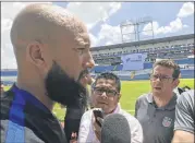  ?? RON BLUM / AP ?? U.S. men’s national team goalkeeper Tim Howard (left) speaks to the media Monday at Estadio Olimpico Metropolit­ano in San Pedro Sula, Honduras.