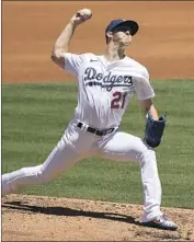  ?? Wally Skalij Los Angeles Times ?? FOR A pitcher who considers himself a work in progress, Walker Buehler shows glimpses of dominance.