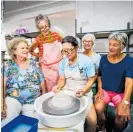  ?? ?? Christine Heaney (left), Caryl McKirdy, Claire Lysaght, Ann Craig and June Rough throwing clay at Taradale Pottery Group’s clubroom reopening in Waiohiki.