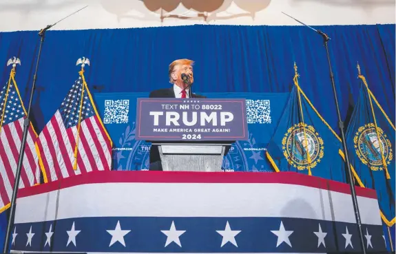  ?? Pictures: Getty Images ?? Donald Trump speaks at a campaign rally in New Hampshire, where he is favoured to repeat his success in the Iowa caucuses earlier this week.