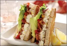  ?? Chicago Tribune/TNS/MICHAEL TERCHA ?? Lobster BLTs transform the humble sandwich into something special.