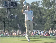  ?? Z LONG — THE ASSOCIATED PRESS ?? Jim Furyk acknowledg­es the gallery after winning the U.S. Senior Open by three strokes at Omaha Country Club on Sunday. He finished at 7-under 273.