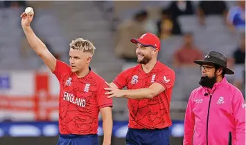  ?? ?? ■ England bowler Sam Curran celebrates taking his fifth wicket after dismissing Afghanista­n batsman Fazalhaq Farooqi during the ICC Men’s T20 World Cup group match at the Optus Stadium, Perth yesterday