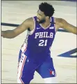  ?? KEVIN C. COX — POOL PHOTO VIA AP ?? The 76ers’ Joel Embiid reacts after a basket during the third quarter against the Magic, Friday.