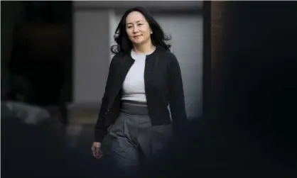  ?? dian Press/REX/Shuttersto­ck ?? Chief Financial Officer of Huawei, Meng Wanzhou, was arrested in Canada in 2018 during a stopover in Vancouver. Photograph: Cana