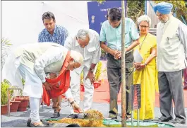  ??  ?? PM Narendra Modi plants a sapling during the foundation stone laying ceremony of the upcoming office complex for Commerce Department, ‘Vanijya Bhawan', in New Delhi on Friday.