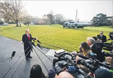  ?? Jim Lo Scalzo EPA/Shuttersto­ck ?? PRESIDENT TRUMP faces new questions about whether he tried to protect his former national security advisor from an FBI inquiry. Interferin­g with the case could be seen as obstructin­g justice, a federal crime.