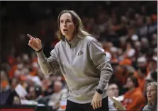  ?? AMANDA LOMAN — THE ASSOCIATED PRESS ?? Colorado coach JR Payne calls out to players during the first half of the team’s game Friday at Oregon State.