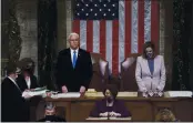  ?? J. SCOTT APPLEWHITE — THE ASSOCIATED PRESS ?? Vice President Mike Pence and Speaker of the House Nancy Pelosi, D-Calif., read the final certificat­ion of Electoral College votes cast in November’s presidenti­al election during a joint session of Congress at the Capitol in Washington on Thursday.