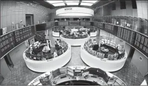  ?? AP/MICHAEL PROBST ?? Desks sit empty
on the floor of the trading room at the German stock market in Frankfurt on Monday. The European Commission on Wednesday blocked a plan to combine the London Stock Exchange and Deutsche Boerse.