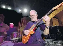  ?? Roberto Serra Getty Images ?? John Abercrombi­e in 2014. He wanted to be seen as “having a direct connection to the history of jazz guitar, while expanding some musical boundaries.” SONIC EXPLORER