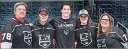  ?? Juan Ocampo L.A. Kings ?? DANIEL BRICKLEY, center, is joined by family members Thursday. They are, from left, his father Matt, brother Sam, sister Abbie and mother Ally.