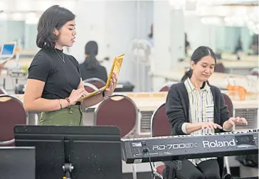  ??  ?? Tidtaya and Isabella developing their musical at the 5th Avenue Theatre’s Raise Your Voice Story Summit.