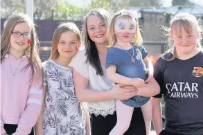  ??  ?? Fun in the sun Local youngsters (from left) Zoe Pattullo (11), Kayleigh Bruce (11), Destiny Wheatley (12), Angela Lochrane (3) and Carlie Jamieson (10)