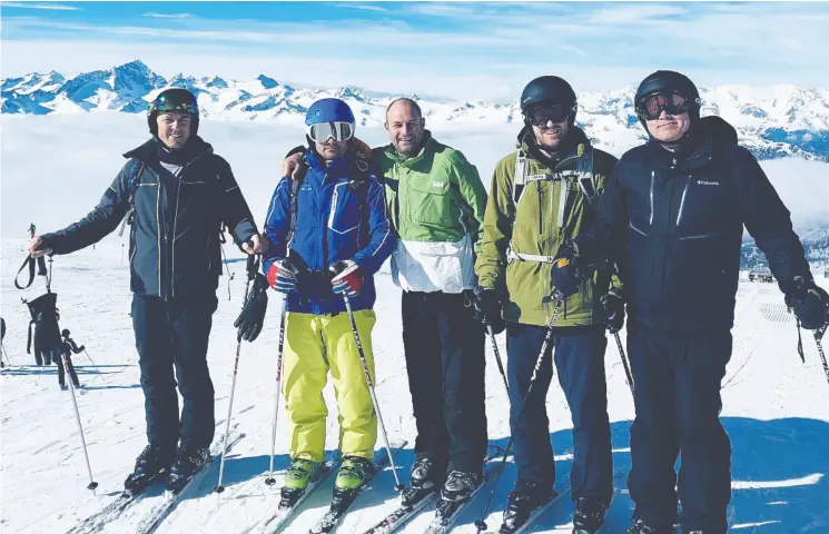  ?? MARCELLO GRASSI ?? Marcello Grassi, far left, with Fraser Dunn, in blue helmet. It was during conversati­ons on a chairlift that Dunn first expressed his career misgivings to Grassi.