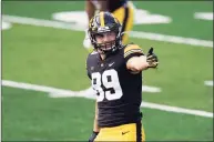  ?? Charlie Neibergall / Associated Press ?? Iowa wide receiver Nico Ragaini gets set for a play during an Oct. 31 game against Northweste­rn. The former ND-West Haven player led Iowa receivers last season with 46 catches for 439 yards as a redshirt freshman.