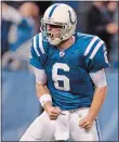  ?? AP FILE PHOTO ?? Dan Orlovsky (6) reacts after throwing a game-winning touchdown pass during the fourth quarter to lift the Indianapol­is Colts to a win over the Houston Texans on Dec. 22, 2011. Orlovsky, currently a free agent, is back at UConn to complete his degree...