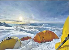  ??  ?? Citing Covid-linked safety concerns, a number of mountainee­ring teams have called off their Everest expedition­s and left.