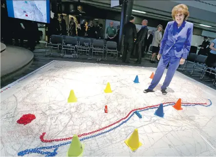  ?? JIM WELLS ?? Alberta’s Lt.-Gov. Lois Mitchell walks on a floor map of Vimy Ridge during a Spirit of Vimy launch event Thursday in Calgary. Mitchell hopes the educationa­l program will foster greater awareness and appreciati­on of Canadian soldiers during the pivotal...
