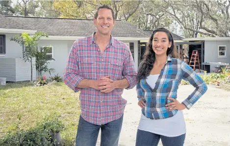  ?? DIY ?? Landscape contractor­s Chris Lambton and Sara Bendrick bring on the curb appeal, from refurbishe­d garage doors to water features and plants in the DIY series “Lawn & Order.”