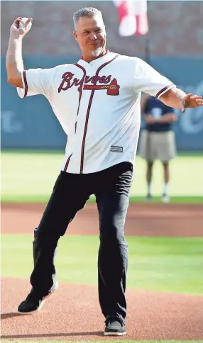  ?? BRETT DAVIS/USA TODAY SPORTS ?? Former Braves star Chipper Jones throws out the first pitch before Game 1 of a 2019 playoff series against the Cardinals on Oct. 3.