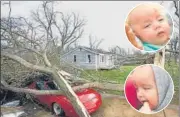  ?? AFP ?? The infants’ grandmothe­r sheltered them in a bathtub, which was found in her yard after the tornado with the babies underneath.