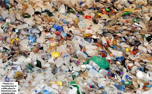  ??  ?? > Plastic at a recycling bay at a Biffa plant in Beaumont Leys, Leicesters­hire