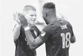  ?? STEPHEN DOWELL/ORLANDO SENTINEL ?? Orlando City forwards Chris Mueller, left, and Daryl Dike, right, were among the four Lions called up for the U.S. men’s national team’s upcoming friendly against Trinidad and Tobago.