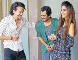  ?? PHOTO: HTCS/AMAL KS ?? (L-R) Actors Tiger Shroff, Nawazuddin Siddiqui and debutante Niddhi Agerwal sharing a moment