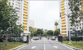  ?? Jay L. Clendenin
Los Angeles Times ?? AN ENTRANCE to the Park La Brea apartment complex, where tenant representa­tives expressed surprise that the LAFD had fallen behind on inspection­s.