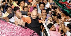  ?? | Reuters ?? BHARATIYA Janata Party (BJP) president Amit Shah arrives at the party headquarte­rs after learning the initial election results.