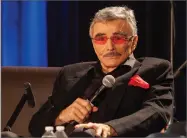  ?? AP FILE PHOTO BY BARRY BRECHEISEN ?? In this Aug. 22, photo, Burt Reynolds appears at the Wizard World Chicago Comic-con in Chicago.