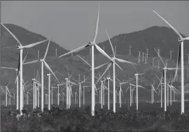  ?? TRIOBUNE NEWS SERVICE ?? A view of wind turbines from Highway 14 in California.