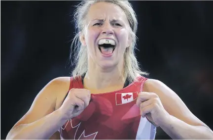  ?? ANDY BUCHANAN/AFP/GETTY IMAGES ?? Wrestler Erica Wiebe says “it’s hard to be an athlete in Canada,” given the tight budgets athletes must live under.