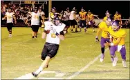  ?? MARK HUMPHREY ENTERPRISE-LEADER ?? Prairie Grove senior wide receiver Isaac Disney catches a 2-point conversion pass from quarterbac­k Zeke Laird to cap the scoring in the Tigers’ 35-14 victory over Vian, Okla. Friday.