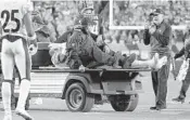  ?? FRANK VICTORES/AP ?? Ryan Shazier, center,was carted off the field after being injured against the Bengals on Dec. 4.