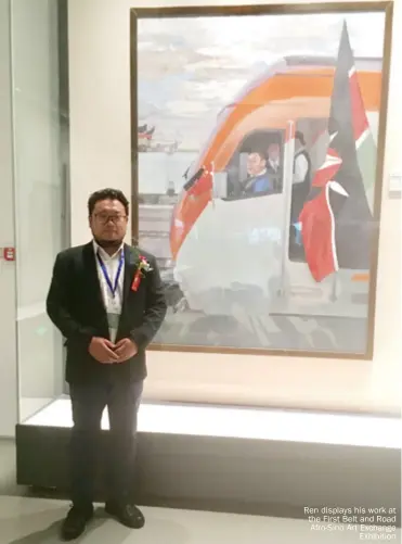 ??  ?? Ren displays his work at the First Belt and Road Afro-sino Art Exchange Exhibition