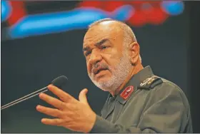  ?? (File Photo/AP/Vahid Salemi) ?? The then-deputy commander of Iran’s Revolution­ary Guard Gen. Hossein Salami speaks in 2018 during a conference in Tehran, Iran. Salami declared March 5 Iran is currently engaged in a fight against a virus which might be the product of an American biological attack.