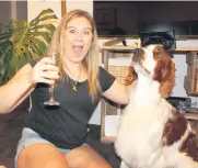  ??  ?? Gryff, the Welsh Springer Spaniel, was not a fan of Helen's graduation cap.