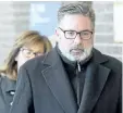  ?? RYAN REMIORZ/ THE CANADIAN PRESS ?? Manager of train operations Jean Demaitre leaves the courtroom Wednesday, in Sherbrooke, Que.