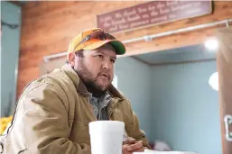  ?? Staff photo by Evan Lewis ?? n Chance Cummings, a 2006 graduate of Prescott High School and four-year letterman, talks about his football career as a starting center for the Curley Wolves during an interview Wednesday at Ko-Fields Diner in Prescott, Ark.