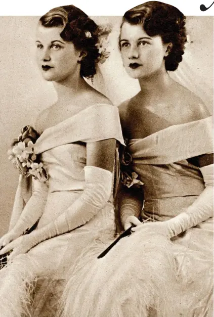  ?? ?? Delightful debutantes: Celia and Mamaine Paget in their court gowns in 1935