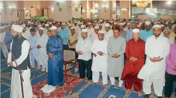  ??  ?? The devout offer Namaz-e-Taraveeh, the additional night prayers on Wednesday at the historic Macca Masjid after the Ruiyat-e-Hilal Committee declared that the moon was sighted heralding the beginning of the month of Ramzan.