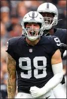  ?? STEVE MARCUS / SUN FILE PHOTO (2022) ?? Las Vegas Raiders defensive end Maxx Crosby (98) celebrates after a sack in a 2022 game at Allegiant Stadium. The edge rusher is one of the most disruptive forces in the NFL today.