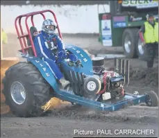  ??  ?? Picture: PAUL CARRACHER TROUBLE: Kevin Delosa and Mid Life Crisis lose a wheel at a modified tractor pull at Blue Ribbon Raceway.